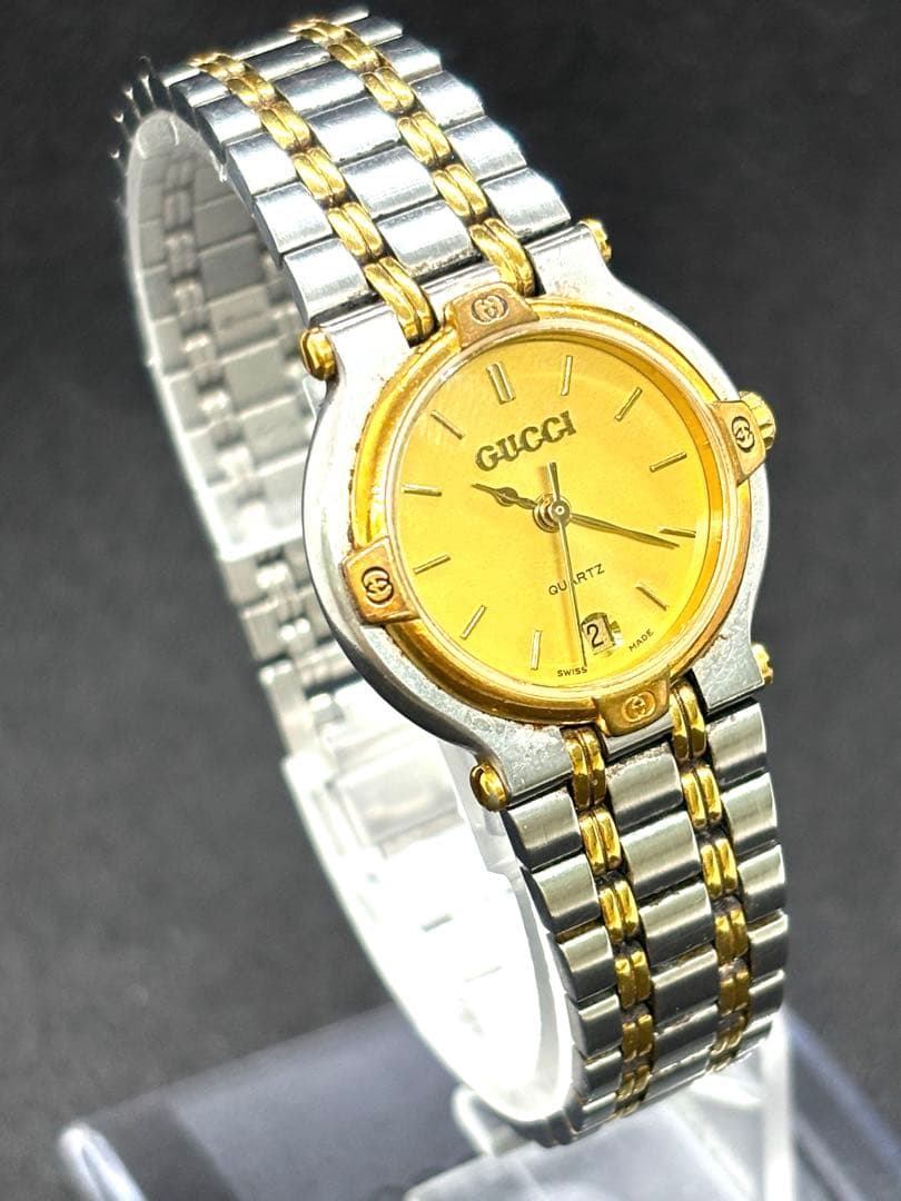 GUCCI 9000Lラウンドデイトゴールド文字盤 QZレディース腕時計 不動