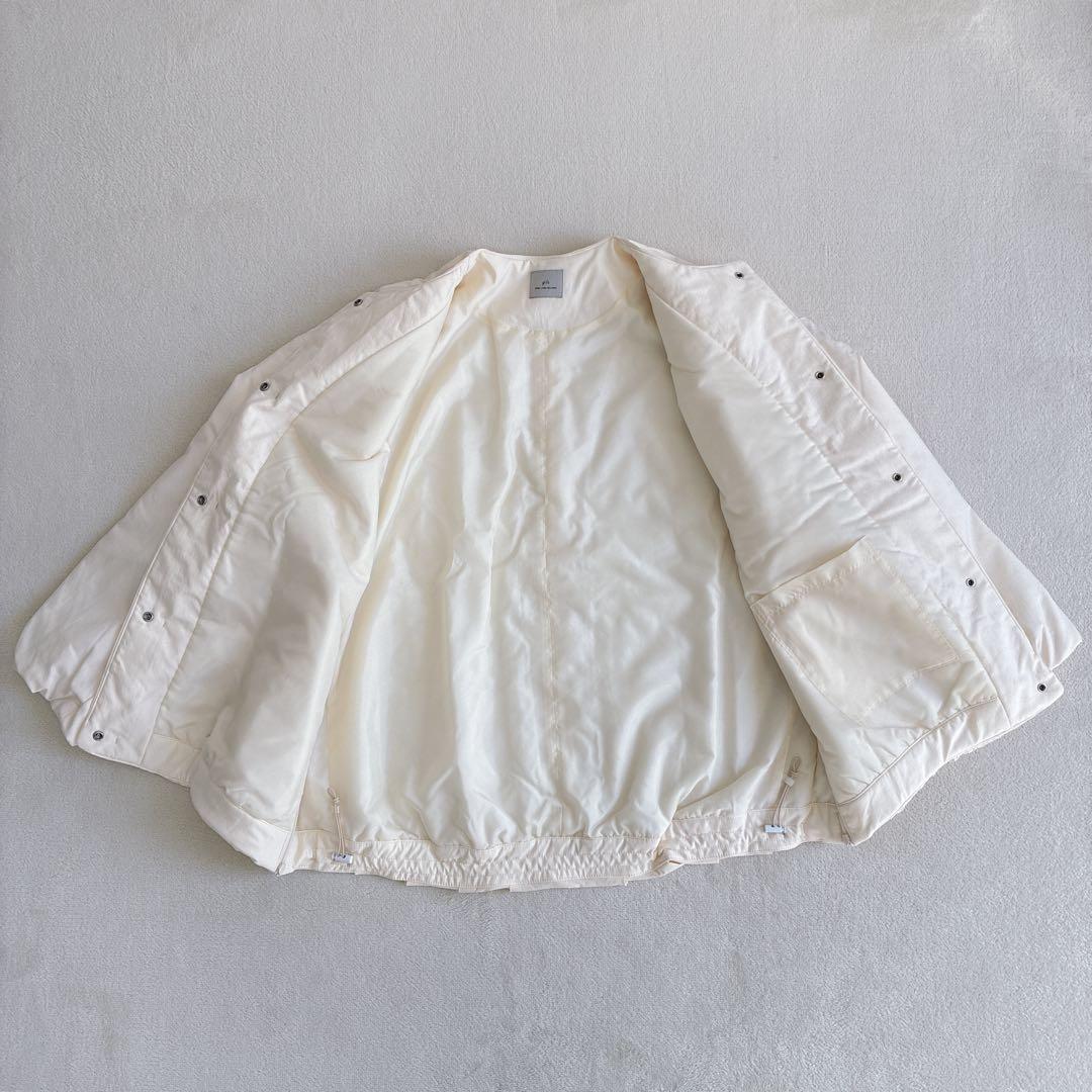 グリーンレーベルリラクシング　パフィー ノーカラー ブルゾン 撥水 保温性