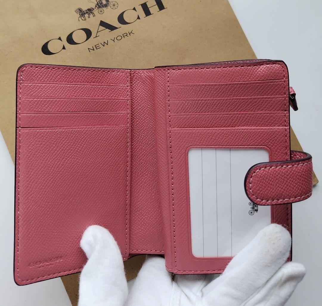 【新品】COACH コーチ 二つ折り財布 シグネチャー ピンク　レザー