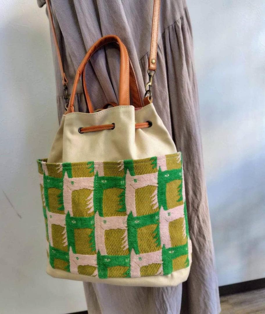 ミナペルホネン/thoroughbredサラブレットマスタード/巾着Lサイズショ