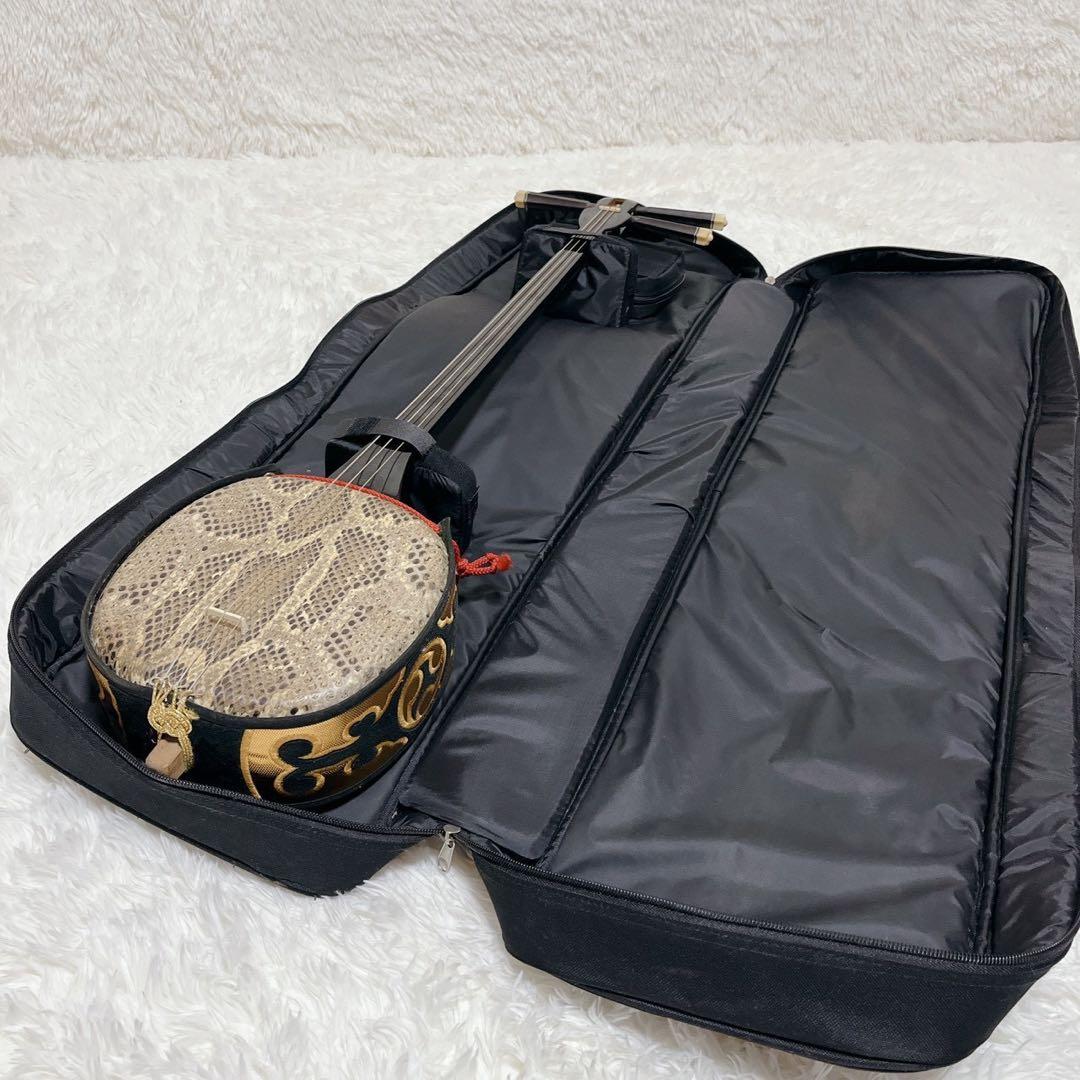 【美品】沖縄三線 本皮 強化張り 二重張り ソフトケース、弦セット、爪付き