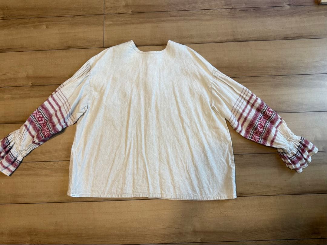 nest Robe（ネストローブ）フリル付き長袖シャツ