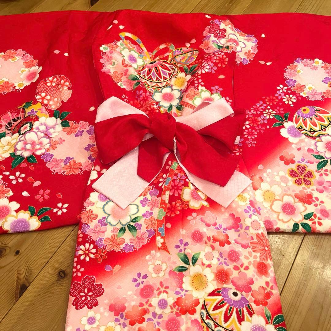 お宮参り　産着　祝着　女の子　襦袢付き 赤地に鞠と熨斗・桜吹雪　正絹