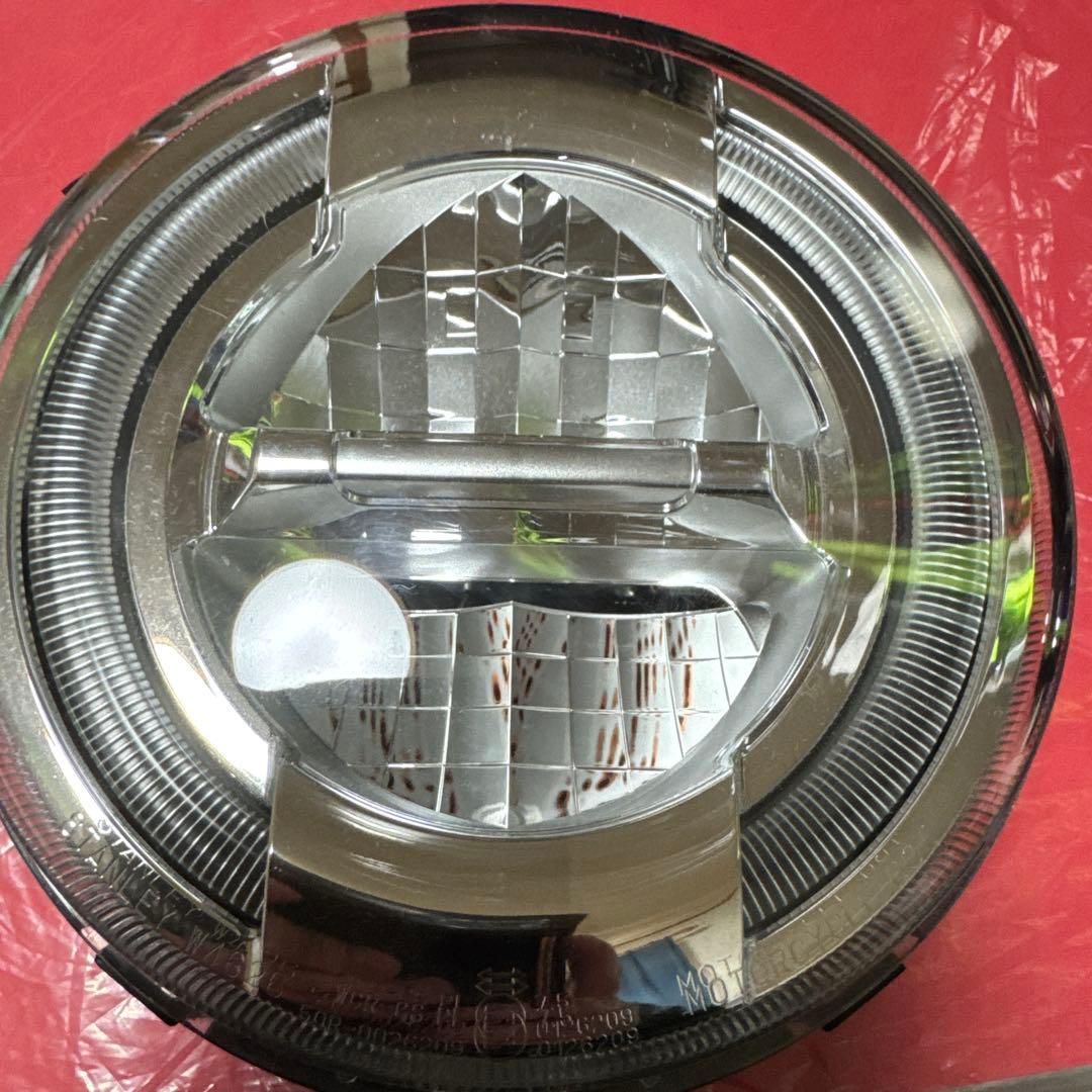 ダックス125純正ヘッドライト・サイドステー