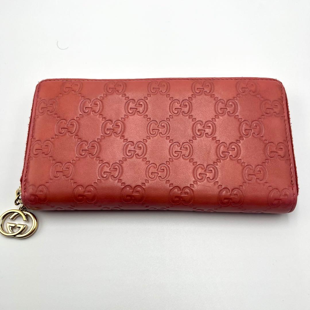 ハ*ス様 グッチ ラウンドジップ シマ ピンク レザー レザー 直営店ショップカ