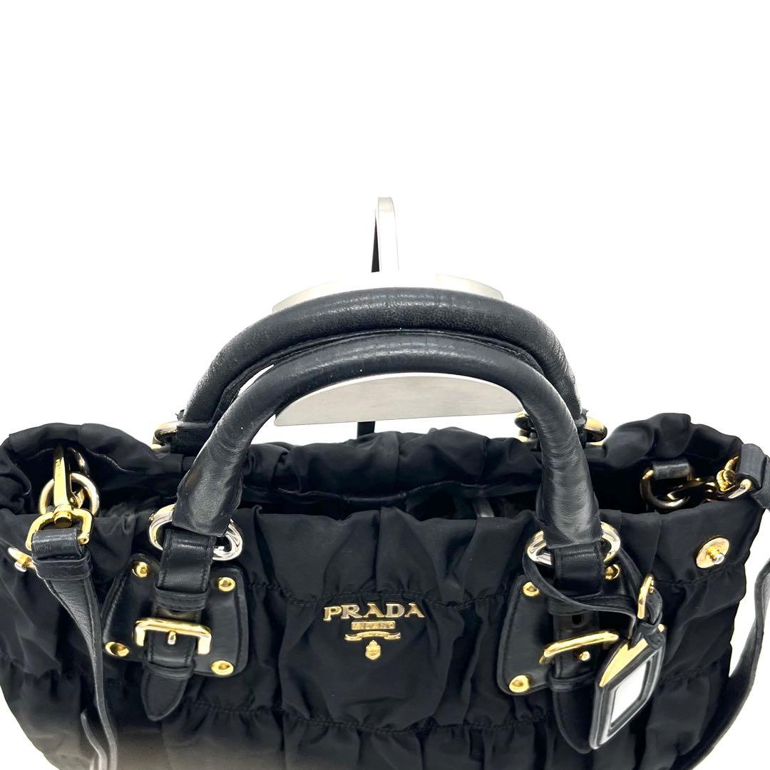 PRADAプラダ ボンバー ギャザー メタルロゴ G金具 2WAYハンドバッグ黒