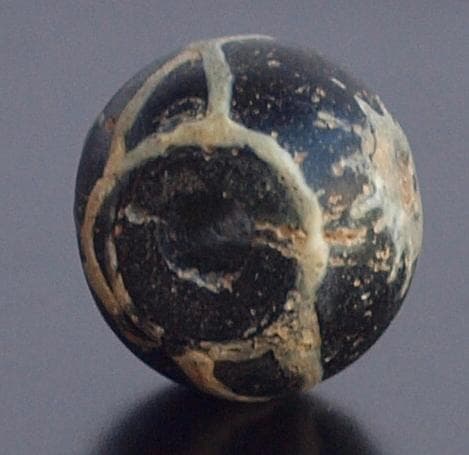 ジャワ発掘、珍しい横向き鳥マニック・ブルン　黒の胎に白で鳥・放射・Ｘ・環モチーフ