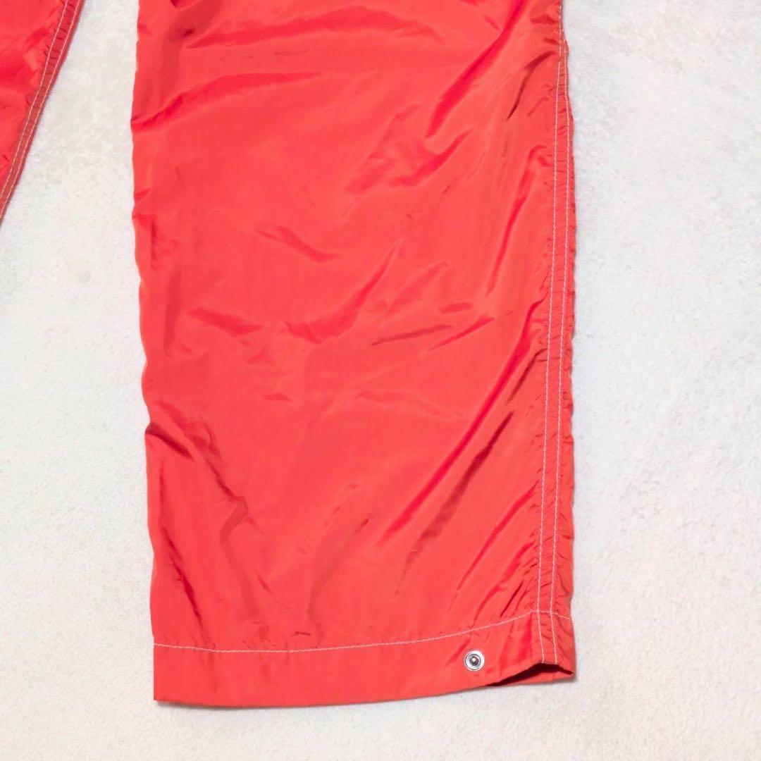 【rough & swell】ナイロン ゴルフパンツ ウエスト調整 オレンジ L