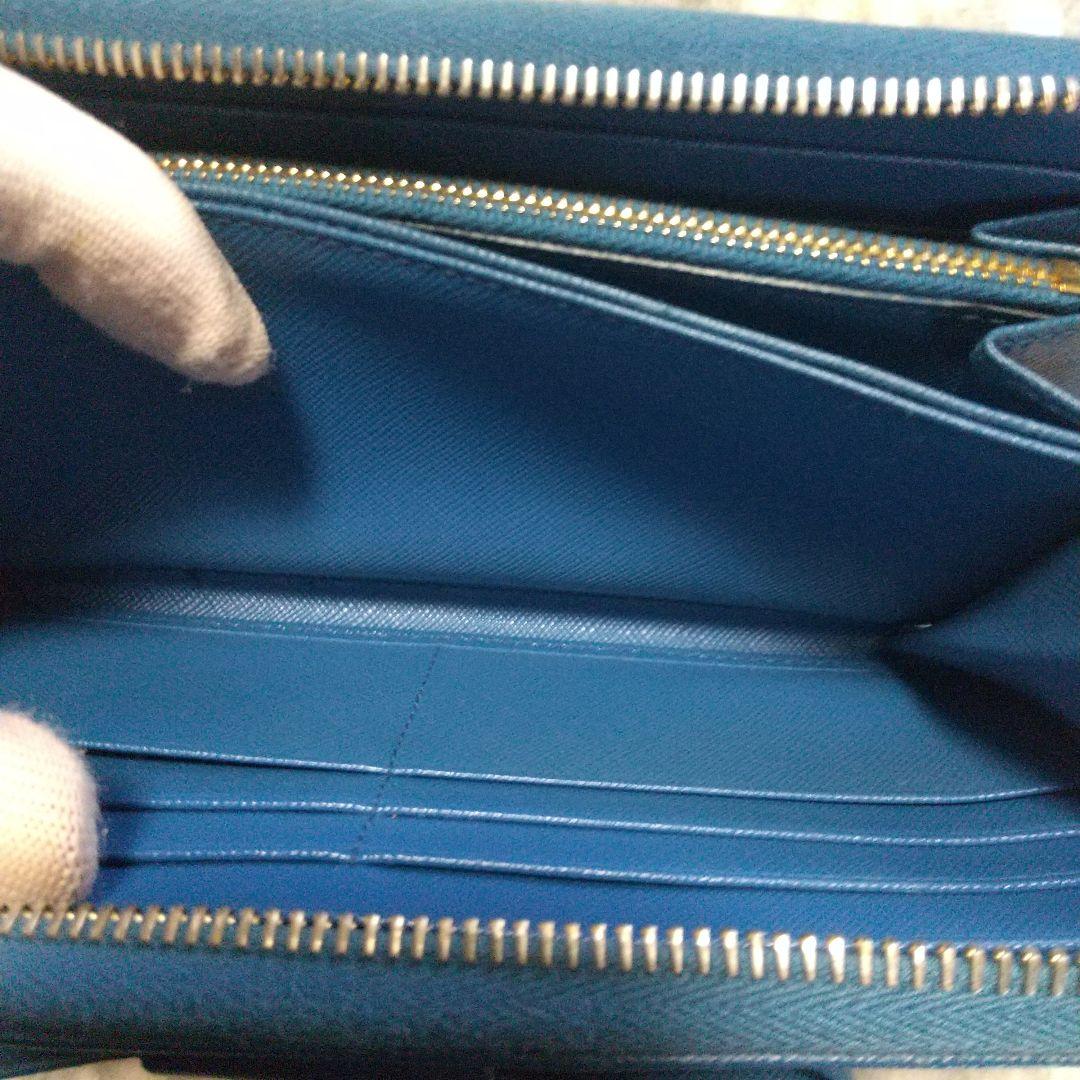 PRADAサフィアーノラウンドファスナー リボン付き長財布