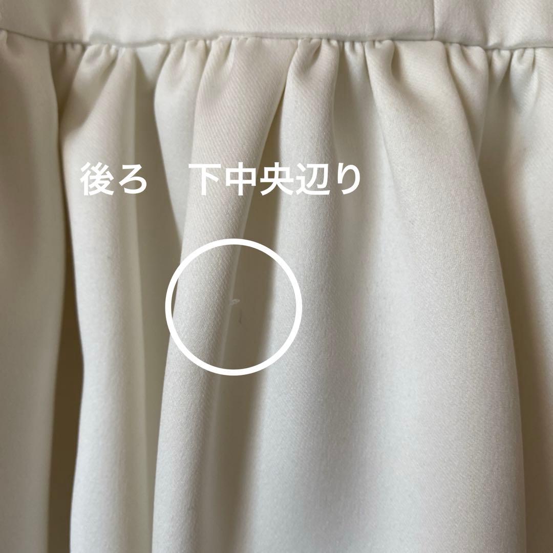 ツルバイマリコオイカワ　パール付きペプラムトップス