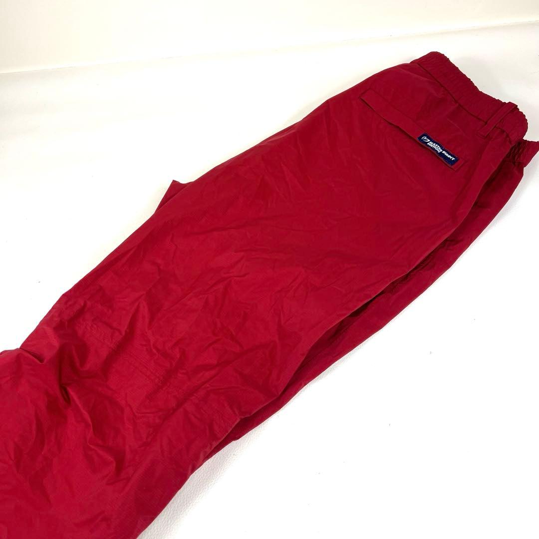 【レインウェア】マスターバニーエディション ゴルフパンツ 雨 耐水 レッド 総柄