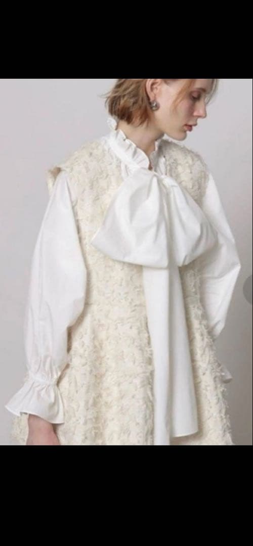 CADUNEカデュネ　リボンヤーンペプラムジレ