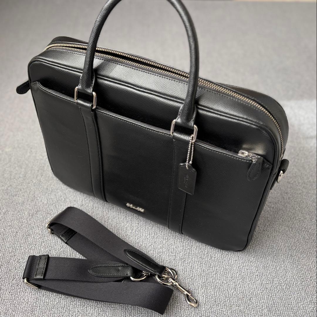 ト*モ様 COACH ブラック ビジネスバッグ