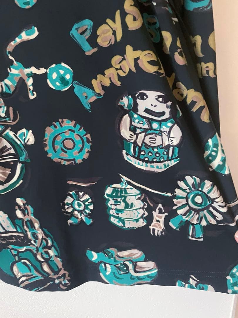 トクコプルミエヴォル/カーキ系グラフィックプリント 長袖チュニック