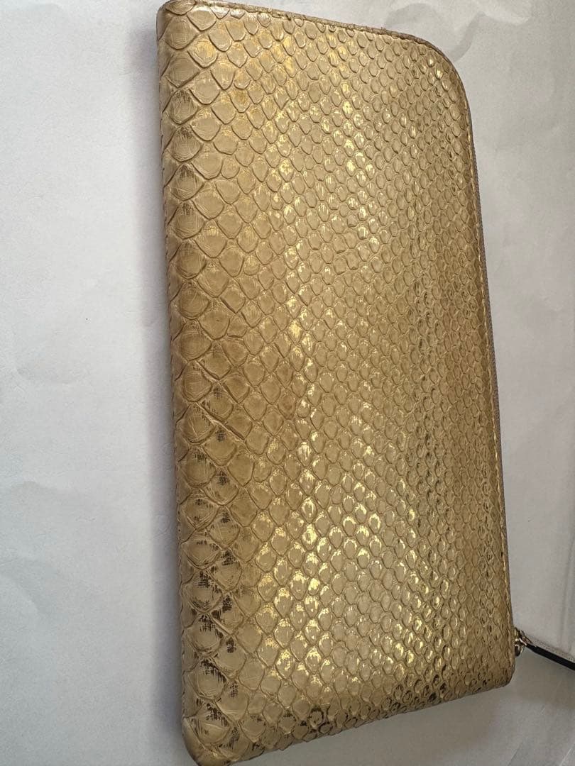 ATAOゴールド ヘビ柄 長財布