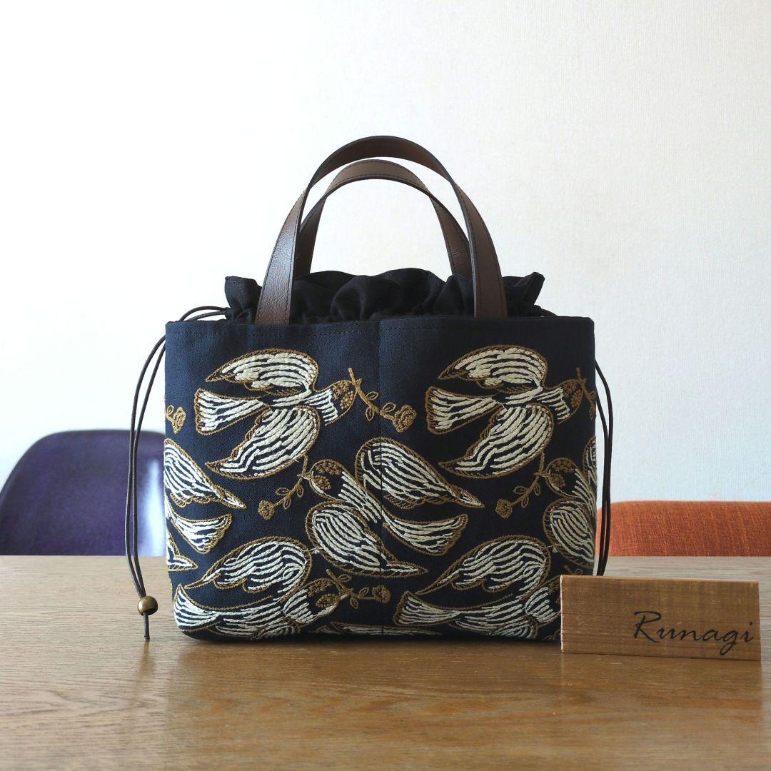 あおりポケットの巾着バッグ＊ミナペルホネン following day