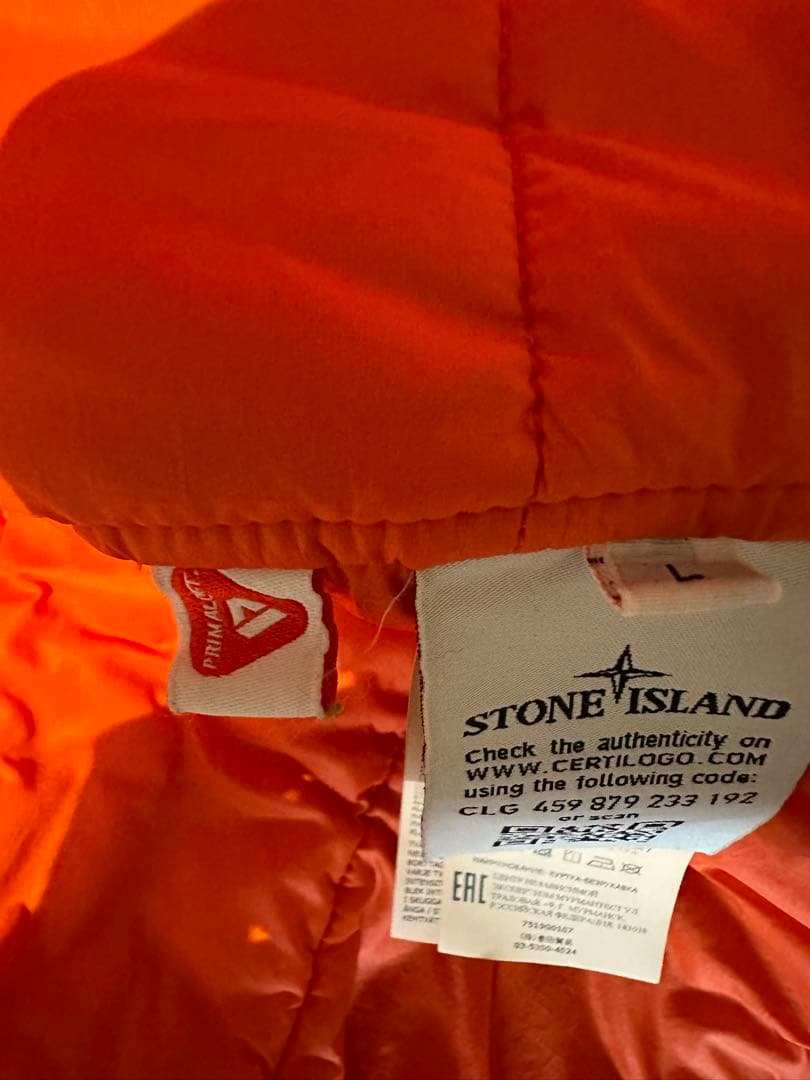 ストーンアイランド シャドウプロジェクト ベスト オレンジ 総柄