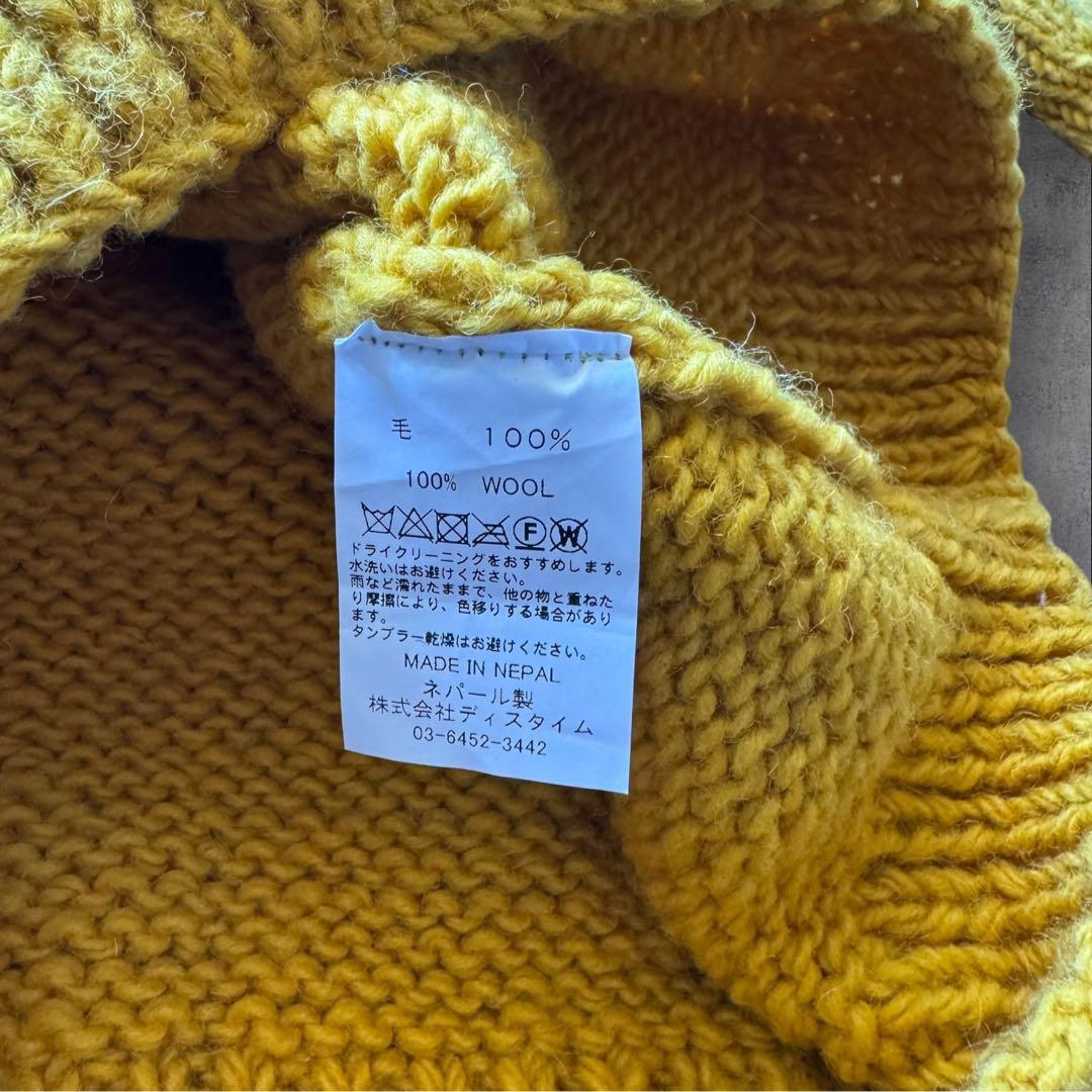 マクマホンニッティングミルズ フラワーロールネックニット　イエロー