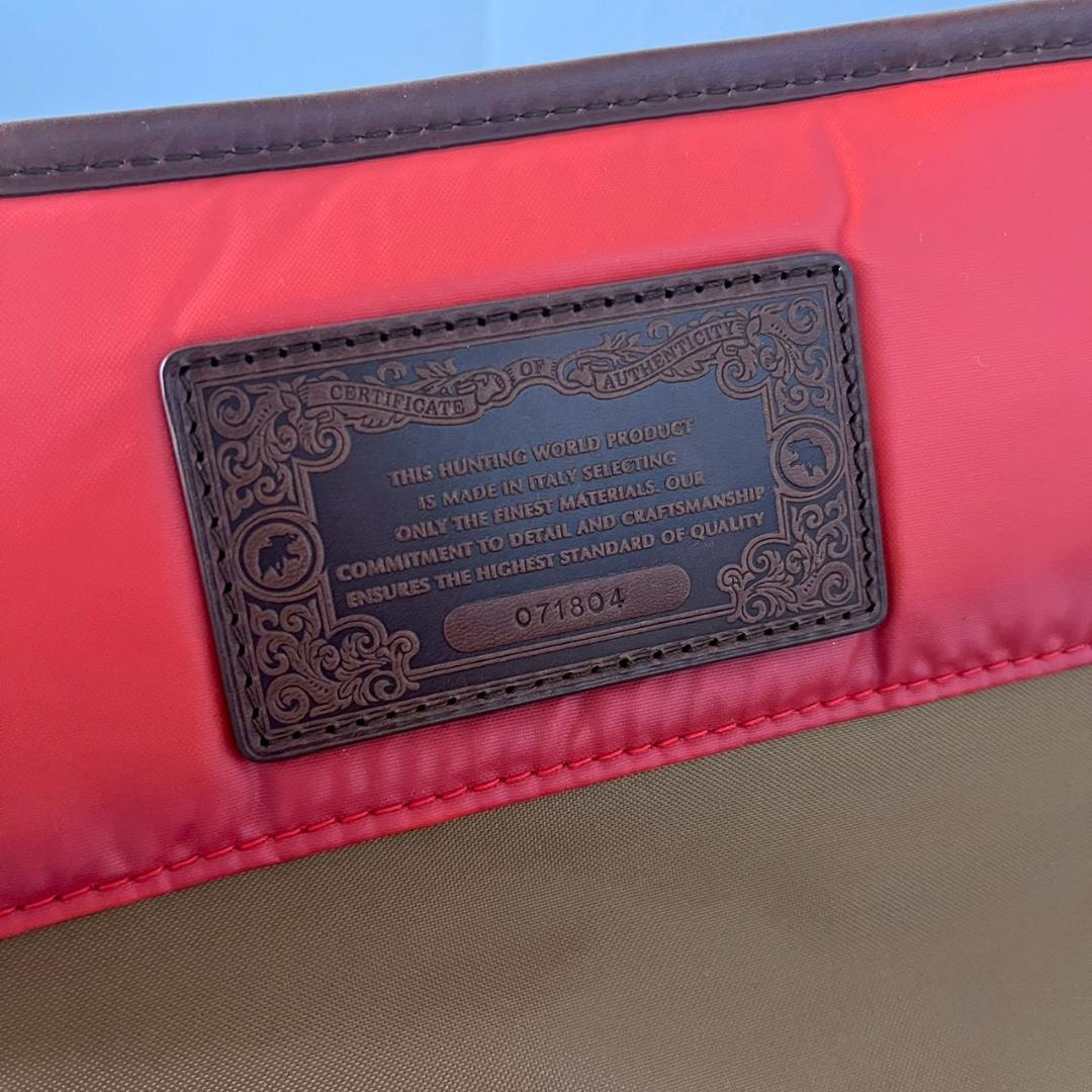 ハンティングワールド バチューサーパス キャリーオール オレンジ バッグ