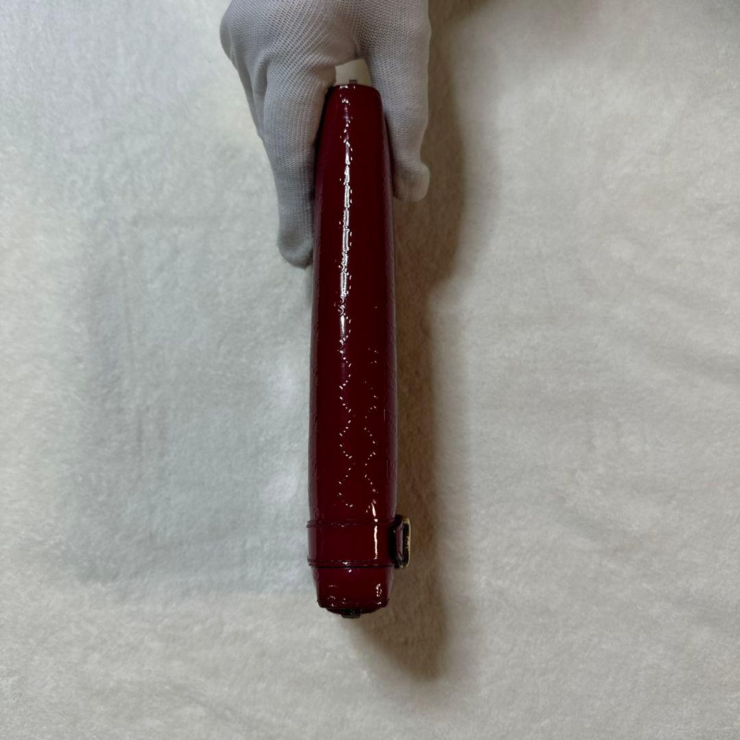 GUCCI（グッチ）マイクログッチシマ エナメルラウンドファスナー長財布