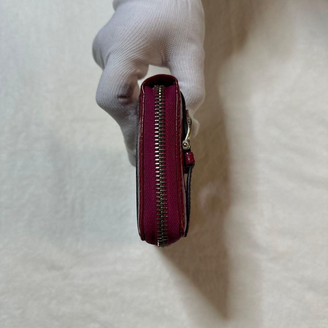 GUCCI（グッチ）マイクログッチシマ エナメルラウンドファスナー長財布