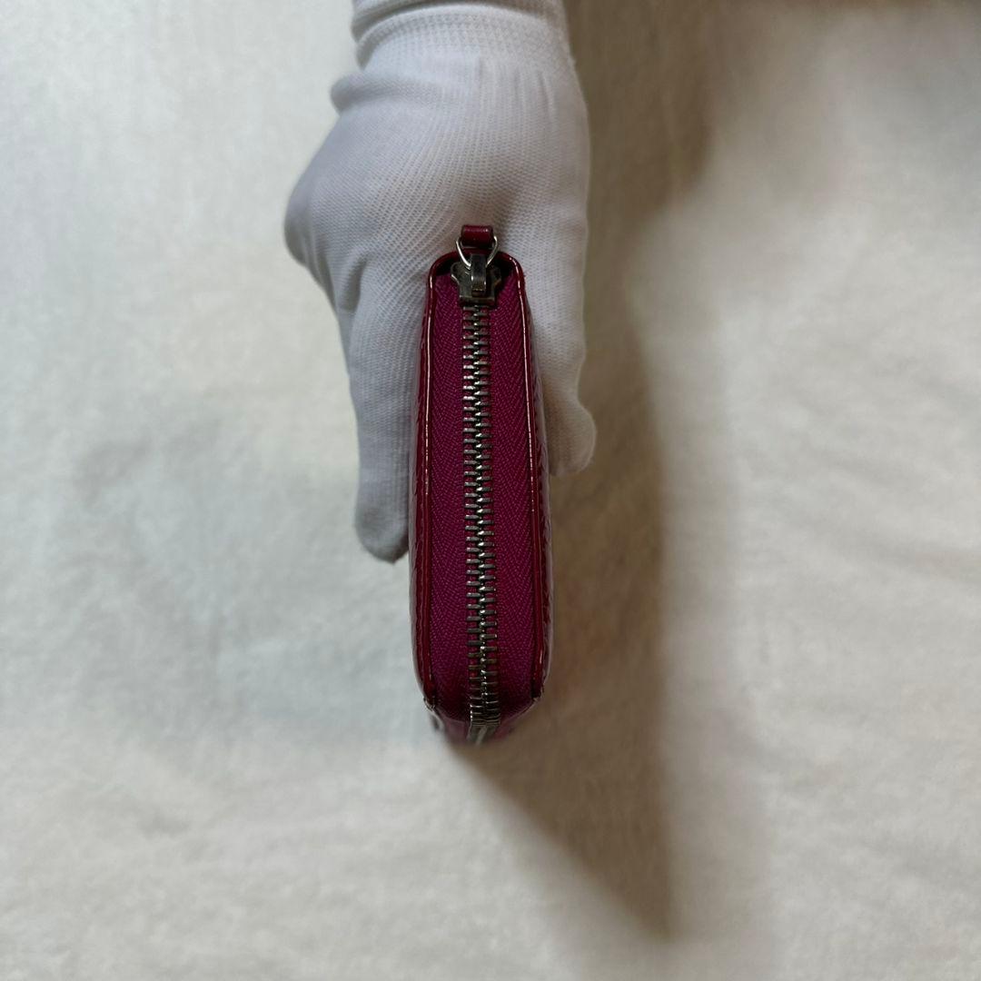 GUCCI（グッチ）マイクログッチシマ エナメルラウンドファスナー長財布