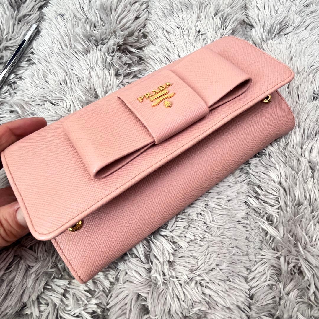 美品✨PRADA サフィアーノ　フィオッコ　リボン　メタルロゴ　長財布　ピンク