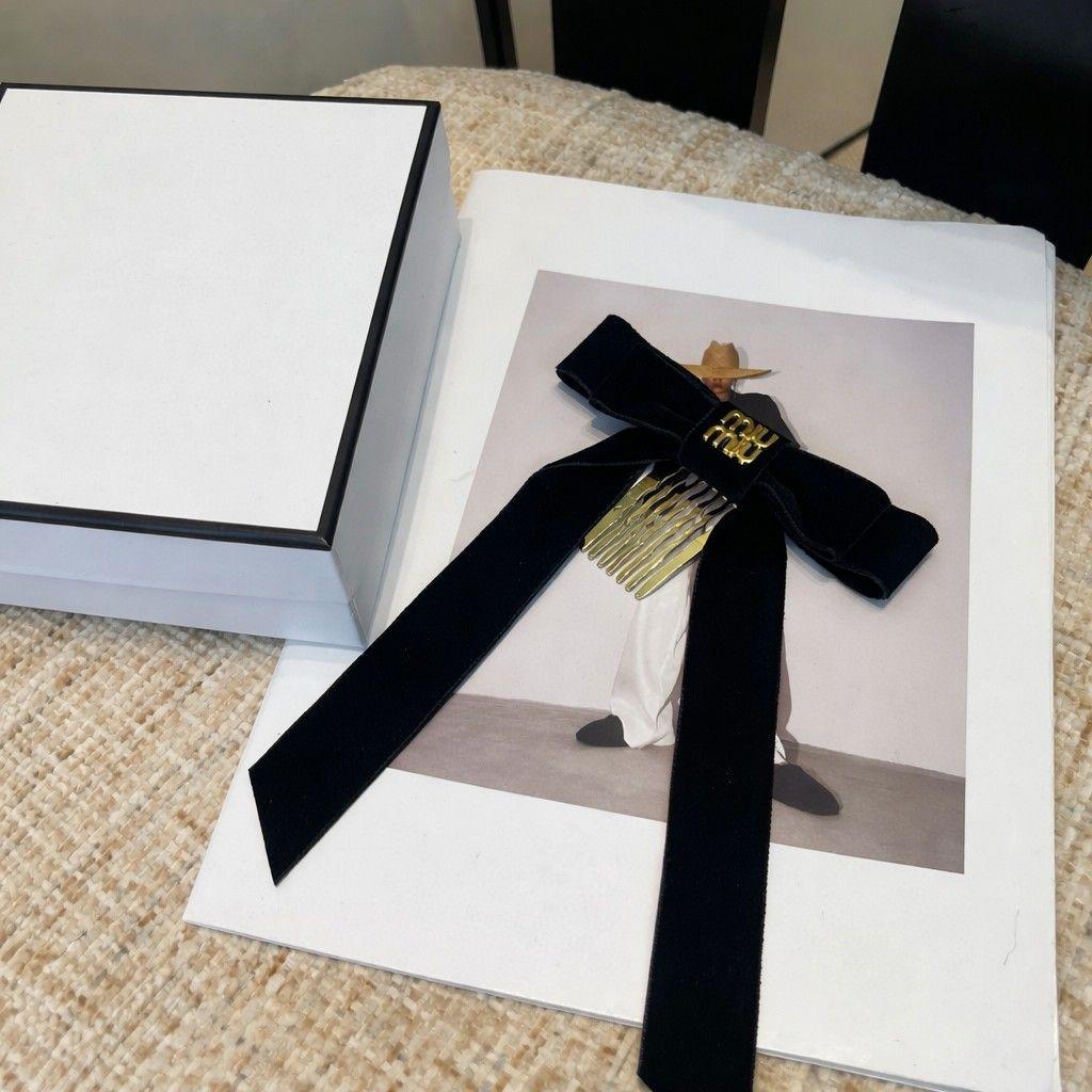 MIU MIU ロゴ付き ベルベットリボン ヘアコーム ブラック